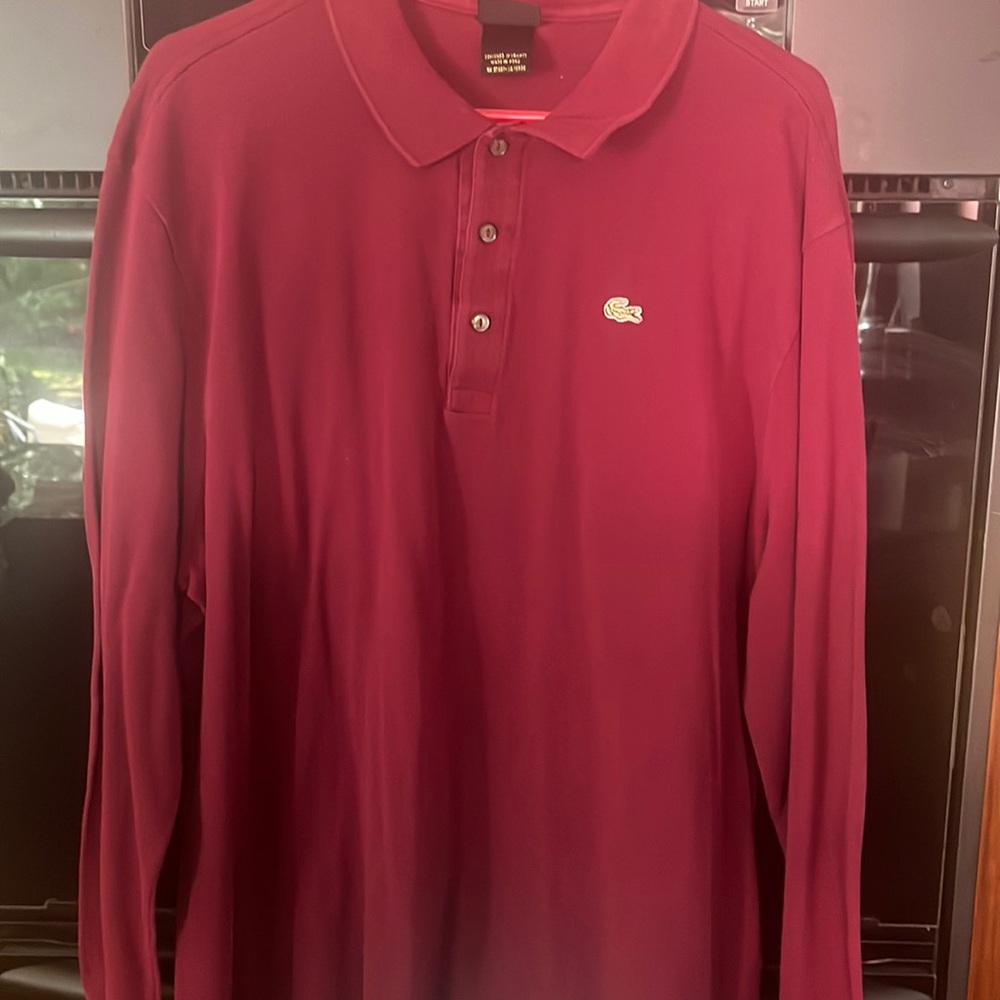 Men’s Lacoste maroon long sleeve polo 3 button shirt. In great condition.